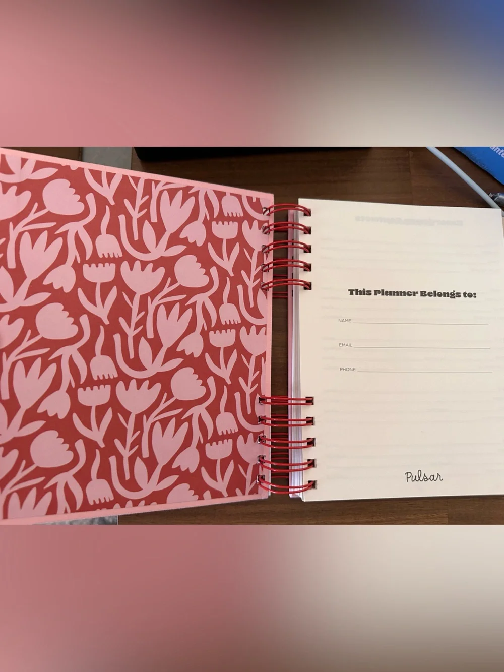 Pulsar Planner with Pink Background and Red Abstract Floral